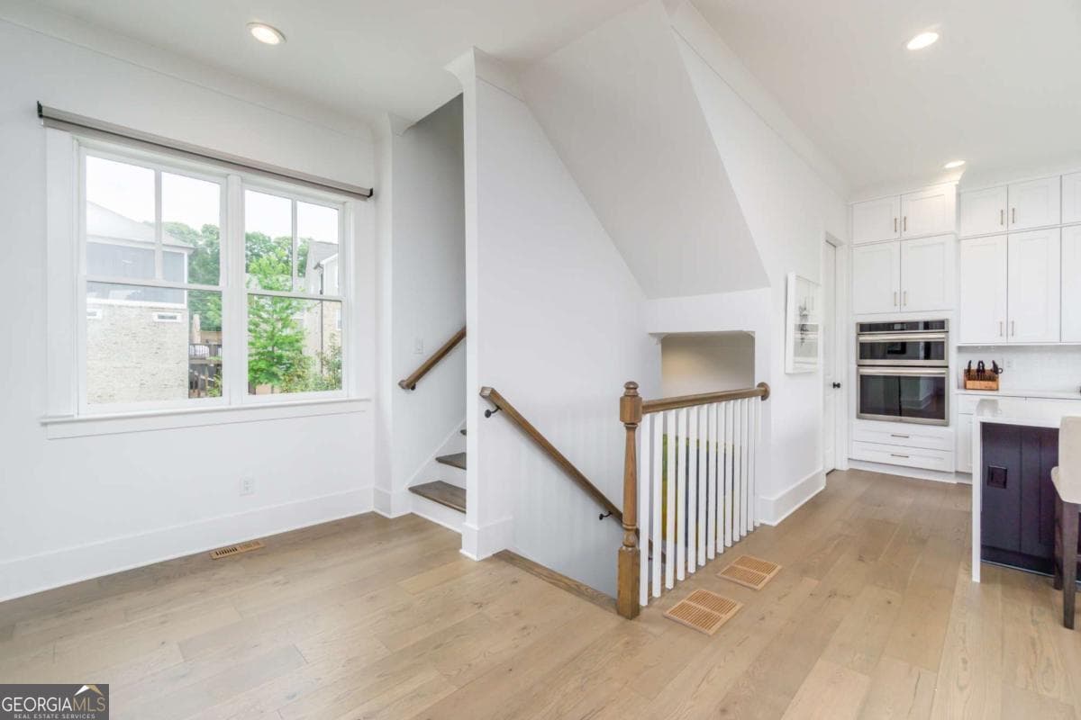 4 bedroom, 3.5 bathroom, 3,190 sq ft single family residence for sale at 6076 Gaines Street, Norcross, GA 30071 — photo 7