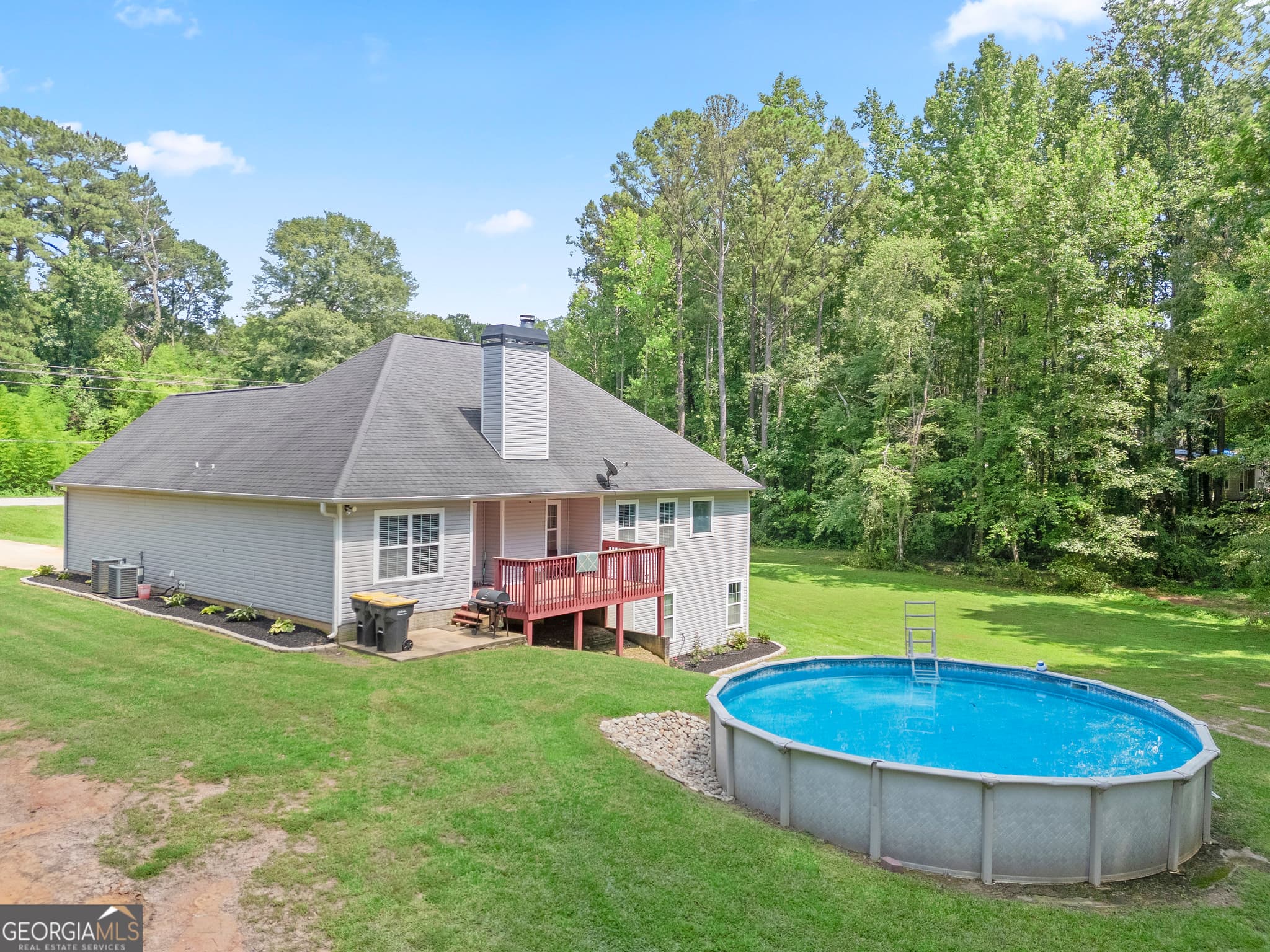 6 bedroom, 3 bathroom, 3,294 sq ft single family residence for sale at 464 Old Carrollton Road, Newnan, GA 30263 — photo 2
