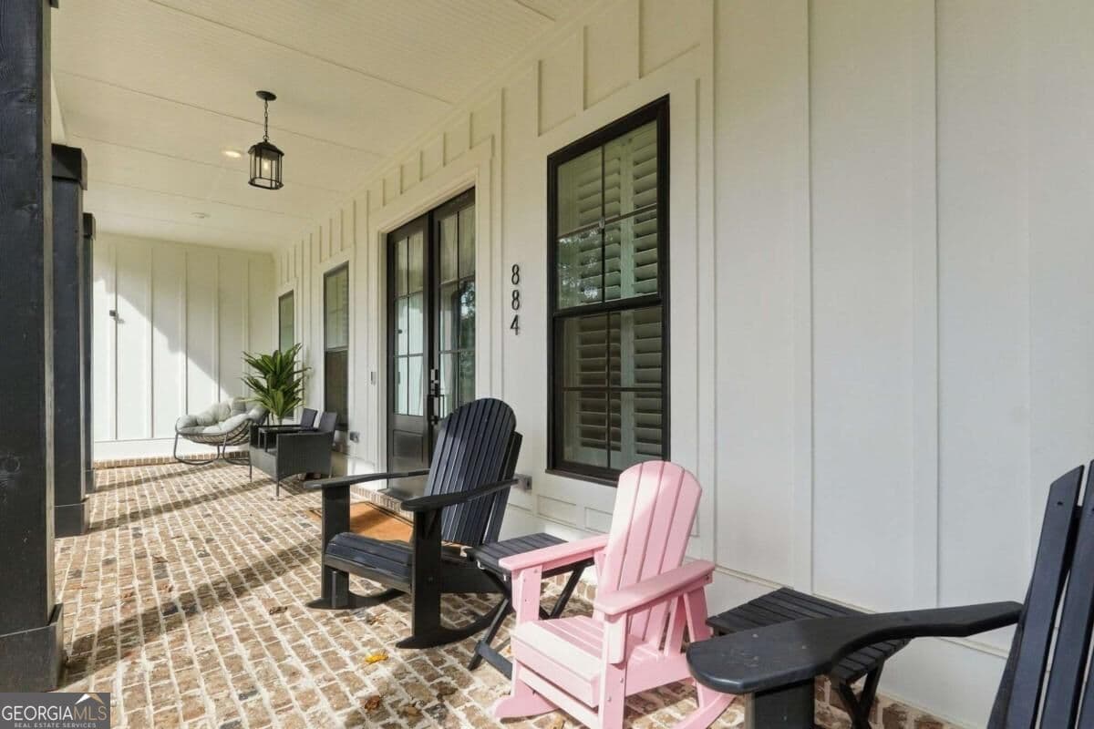 5 bedroom, 4.5 bathroom, 4,166 sq ft single family residence for sale at 884 Oxford Road, Ball Ground, GA 30107 — photo 2