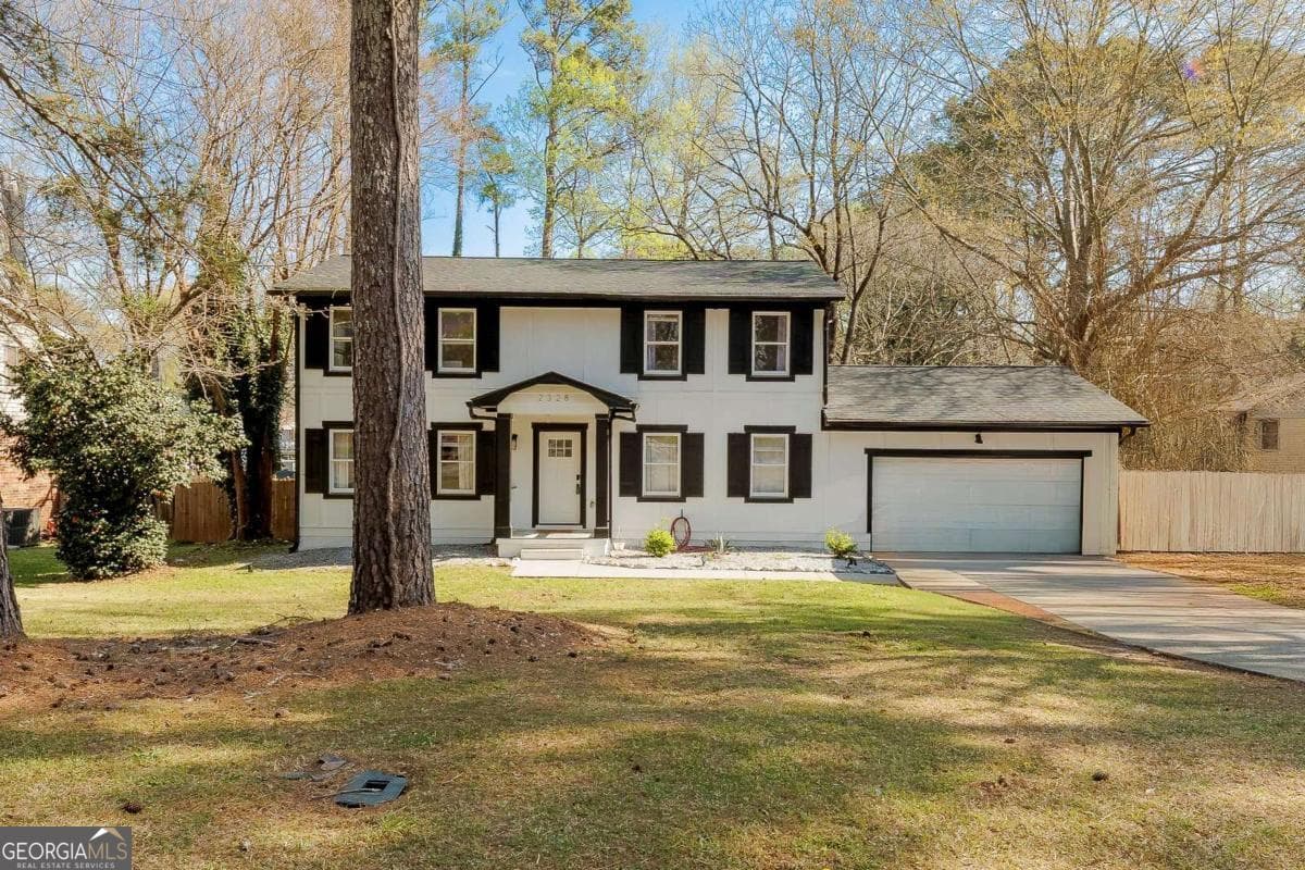 4 bedroom, 2.5 bathroom, 2,080 sq ft single family residence for sale at 2328 Carnes Road, Jonesboro, GA 30236 — photo 3