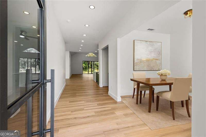 4 bedroom, 3.5 bathroom, 3,307 sq ft single family residence for sale at 520 Rockbridge Road, Lilburn, GA 30047 — photo 2
