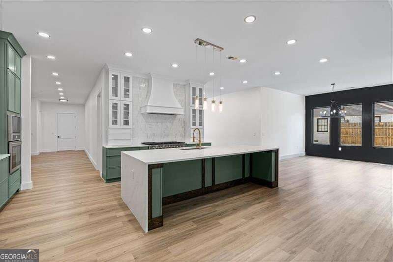 4 bedroom, 3.5 bathroom, 3,307 sq ft single family residence for sale at 520 Rockbridge Road, Lilburn, GA 30047 — photo 8