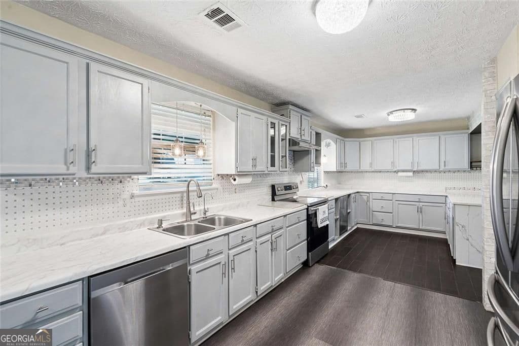 5 bedroom, 3 bathroom, 2,100 sq ft single family residence for sale at 3587 Miller Bottom Road, Loganville, GA 30052 — photo 7