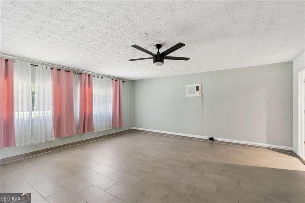 5 bedroom, 3 bathroom, 2,100 sq ft single family residence for sale at 3587 Miller Bottom Road, Loganville, GA 30052 — photo 9