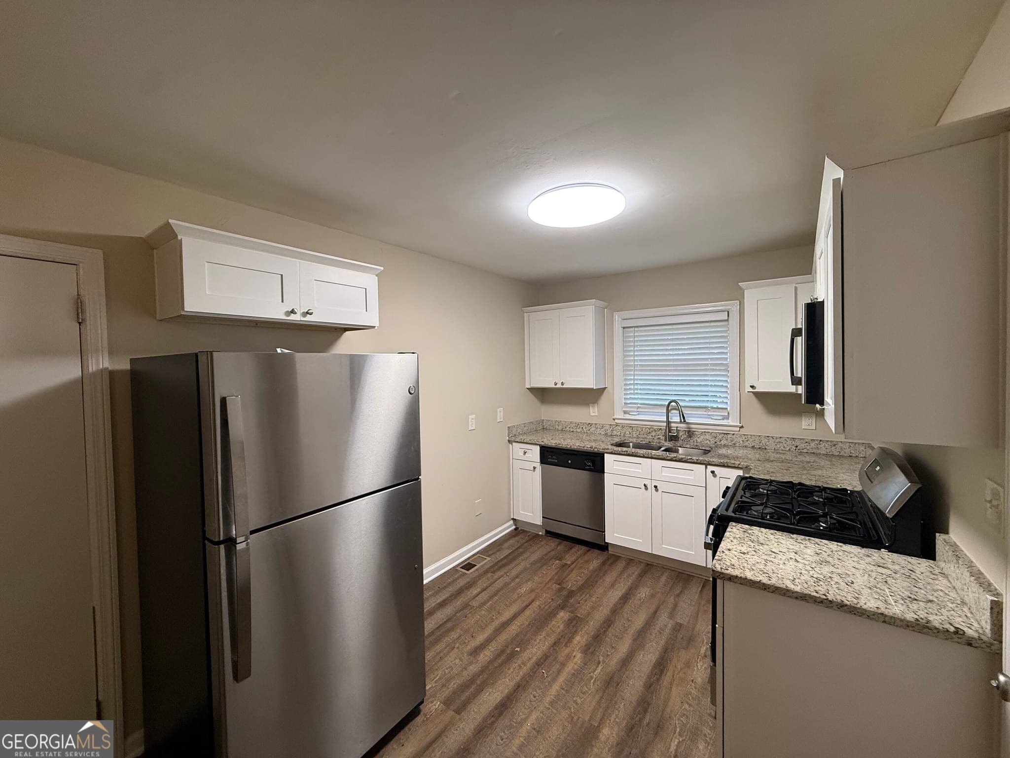 4 bedroom, 2 bathroom, 1,561 sq ft single family residence for sale at 2431 Ivydale Drive, Atlanta, GA 30311 — photo 4