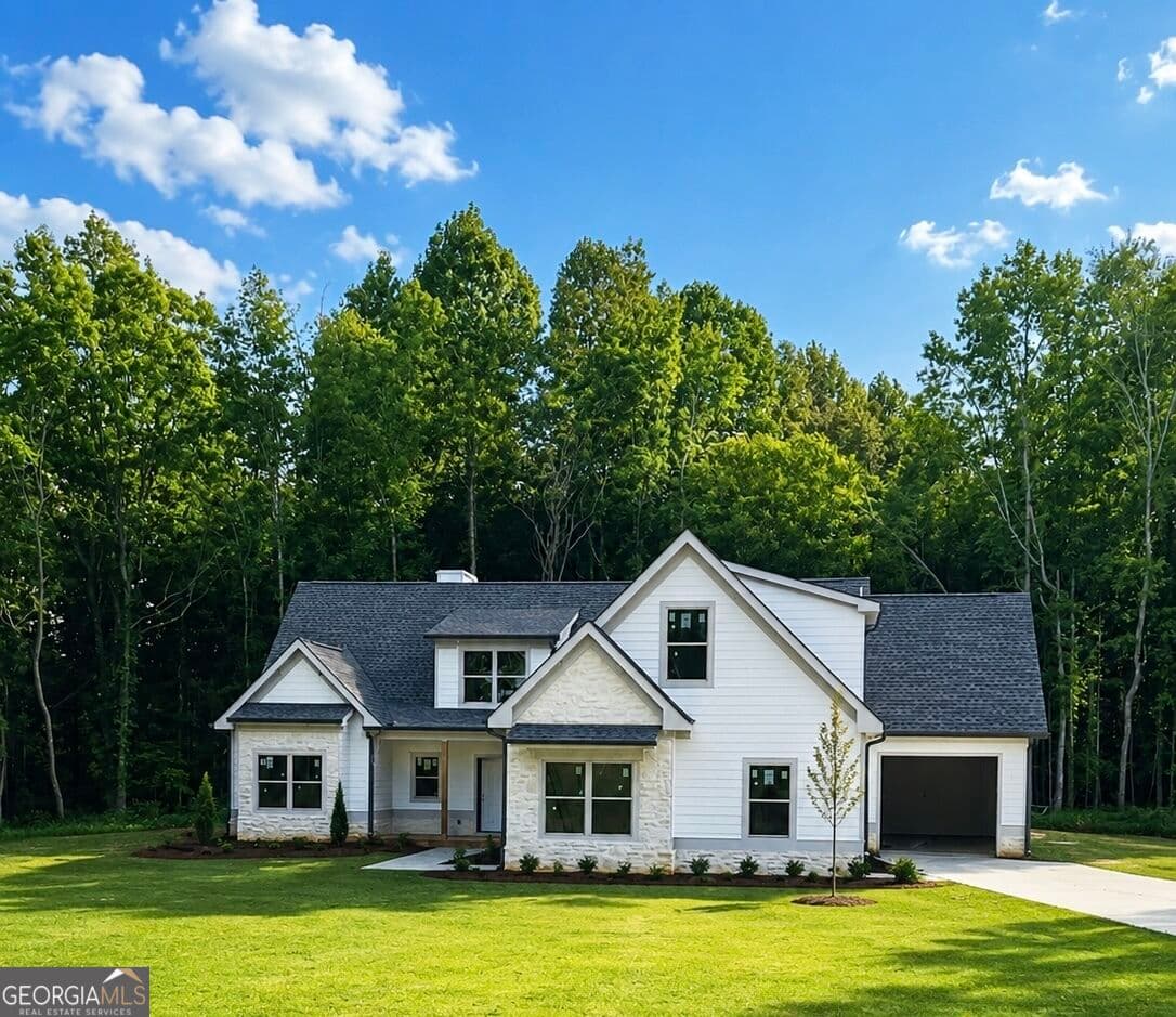 4 bedroom, 3.5 bathroom single family residence for sale at 1455 Alcovy Station Road, Covington, GA 30014 — photo 1 of 3