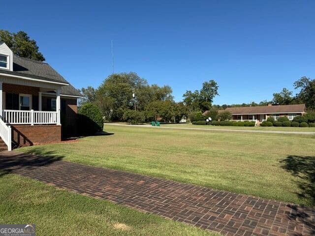 3 bedroom, 2 bathroom, 2,454 sq ft single family residence for sale at 301 Davis Street, Warrenton, GA 30828 — photo 2