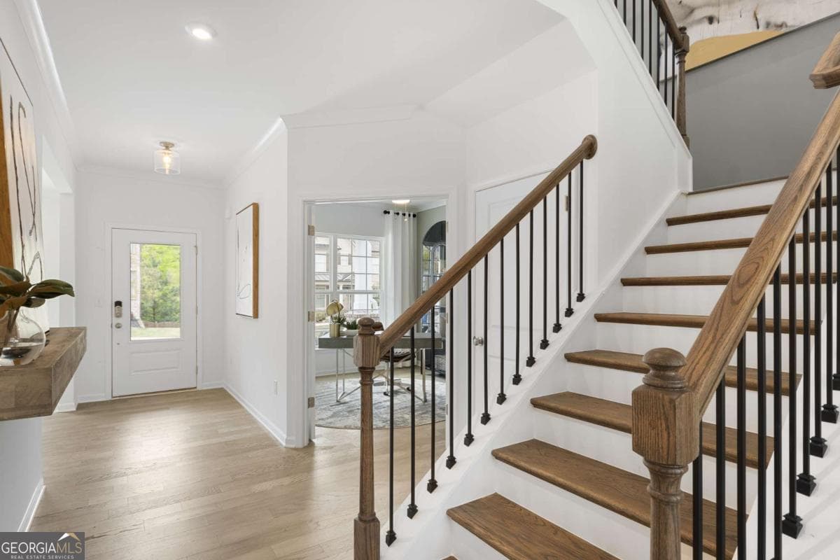 5 bedroom, 4.5 bathroom, 3,309 sq ft single family residence for sale at 5268 Mulberry Pass Court, Hoschton, GA 30548 — photo 4