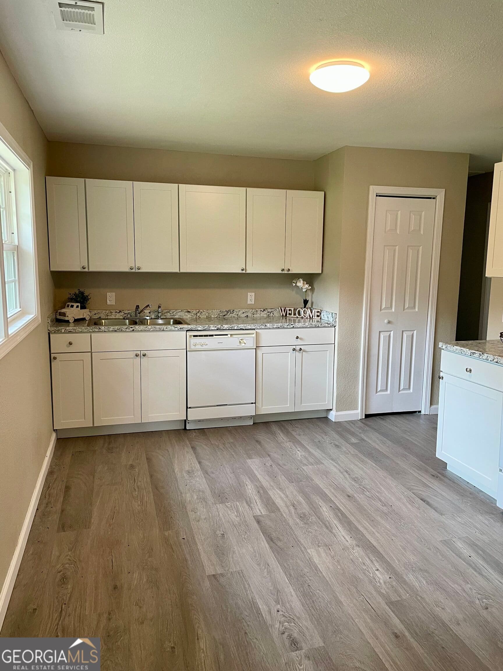 3 bedroom, 1.5 bathroom, 1,248 sq ft single family residence for sale at 1109 5th Avenue, Vidalia, GA 30474 — photo 3