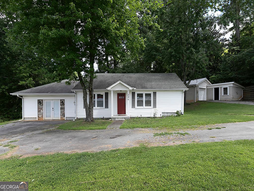 4 bedroom, 2 bathroom, 1,679 sq ft single family residence for sale at 234 E Memorial Drive, Dallas, GA 30132 — photo 1 of 28