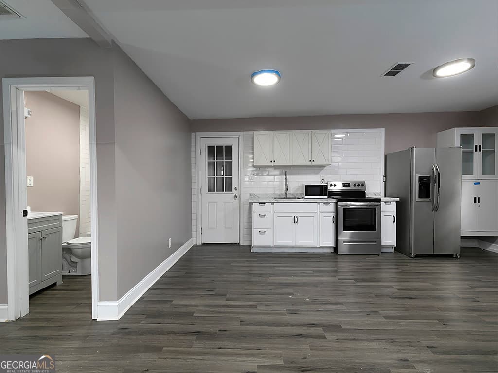 4 bedroom, 2 bathroom, 1,679 sq ft single family residence for sale at 234 E Memorial Drive, Dallas, GA 30132 — photo 9