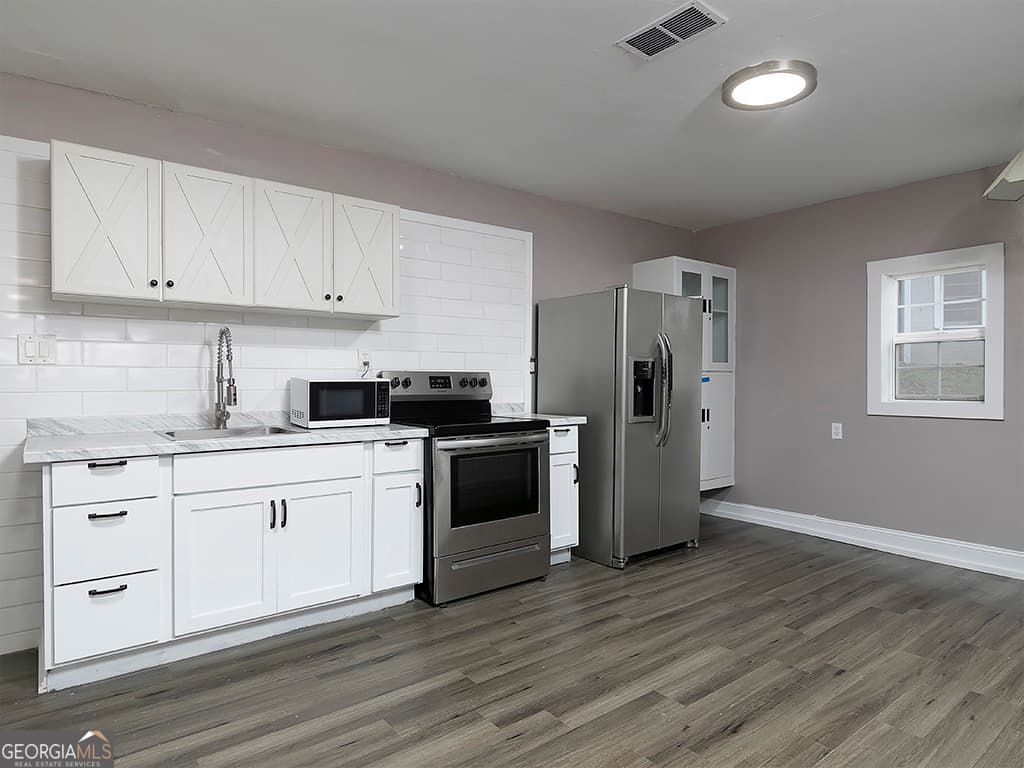4 bedroom, 2 bathroom, 1,679 sq ft single family residence for sale at 234 E Memorial Drive, Dallas, GA 30132 — photo 10