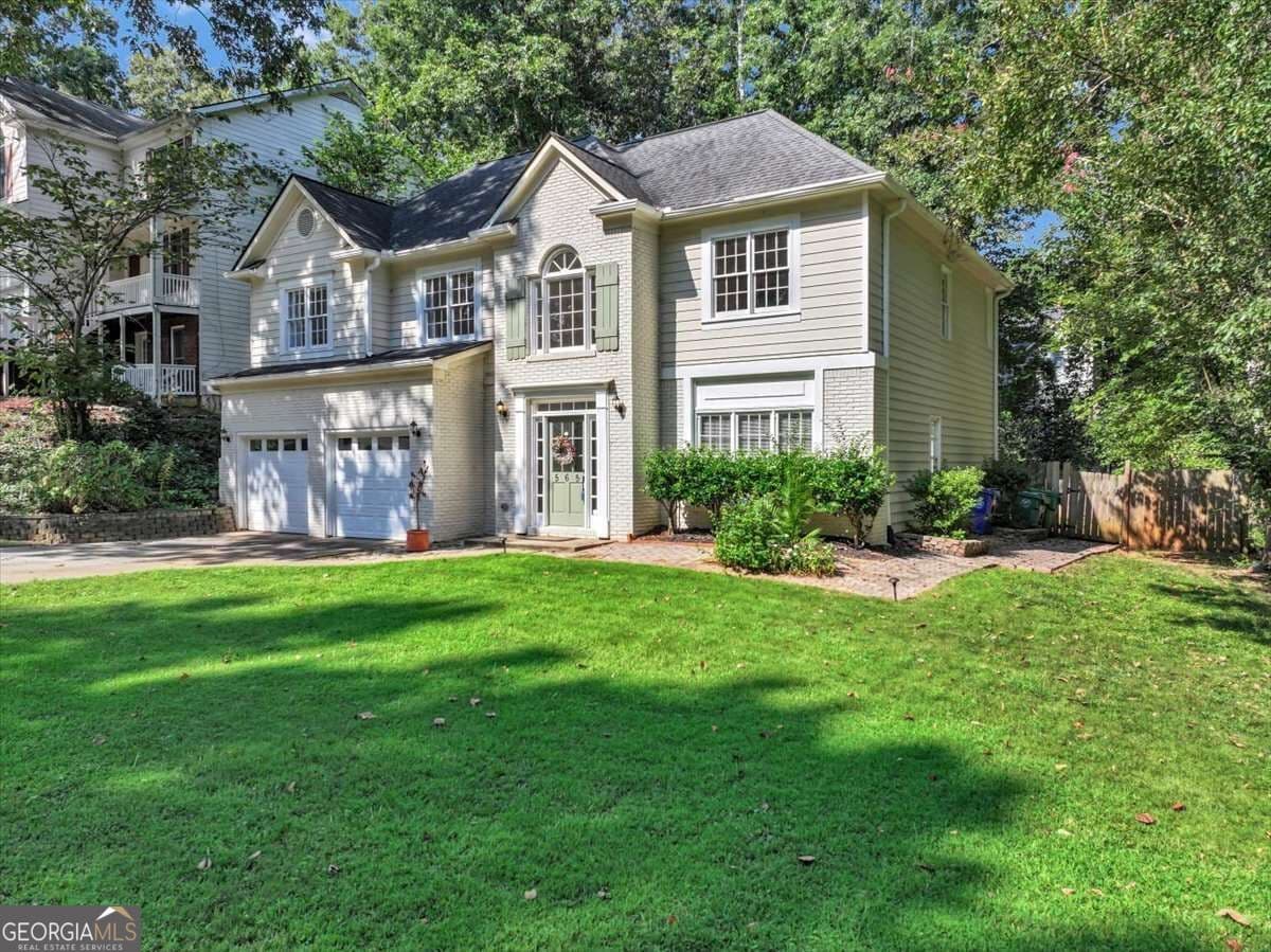 4 bedroom, 2.5 bathroom, 2,415 sq ft single family residence for sale at 565 Fortune Ridge Road, Stone Mountain, GA 30087 — photo 2