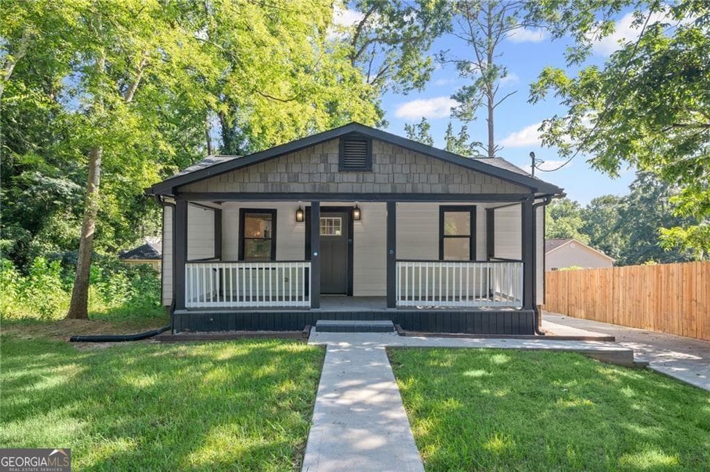 4 bedroom, 3 bathroom, 3,100 sq ft single family residence for sale at 1987 Ruth Street, Atlanta, GA 30318 — photo 1 of 35