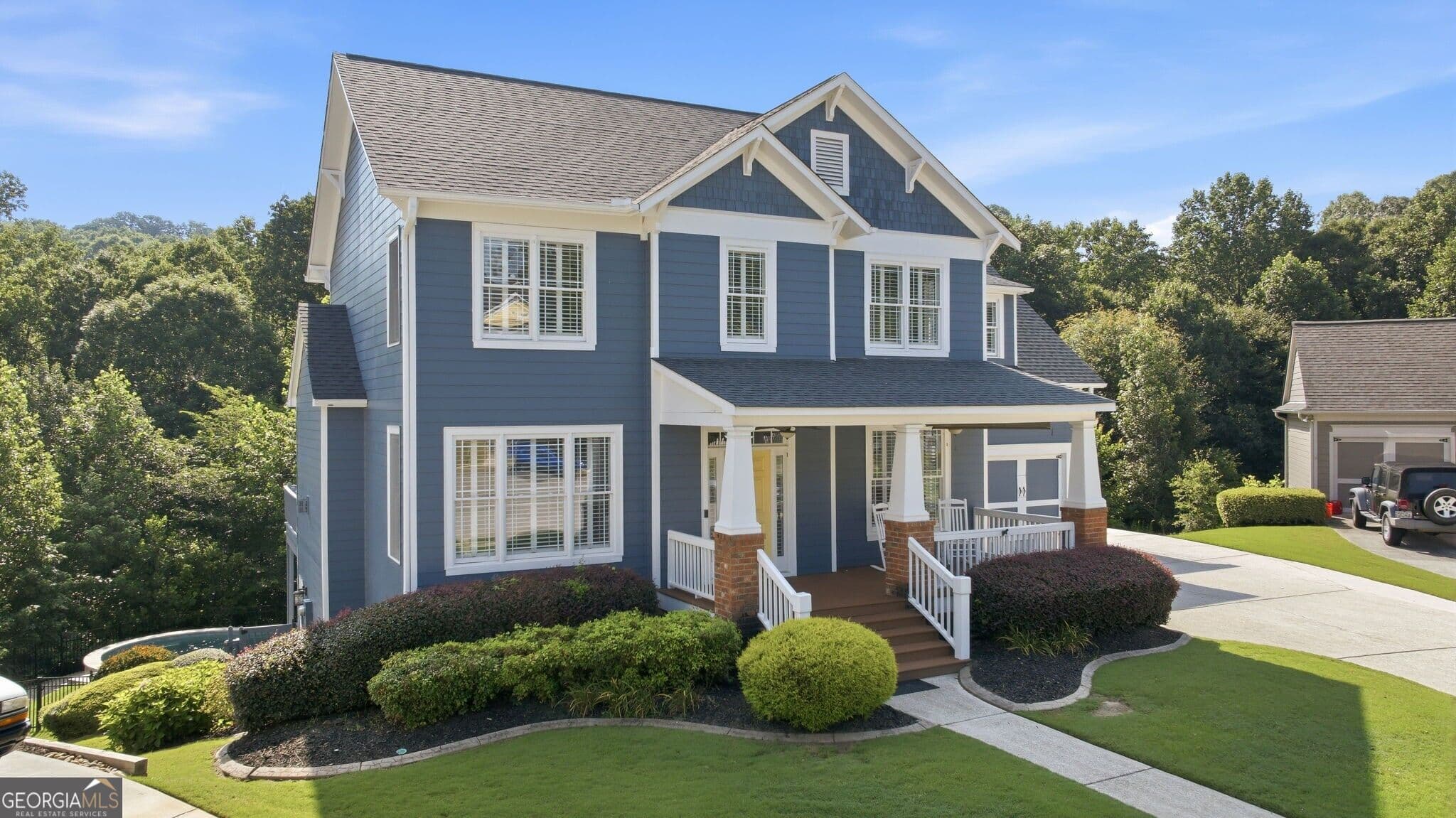 5 bedroom, 4.5 bathroom, 4,985 sq ft single family residence for sale at 7327 Rocking Chair Lane, Hoschton, GA 30548 — photo 2