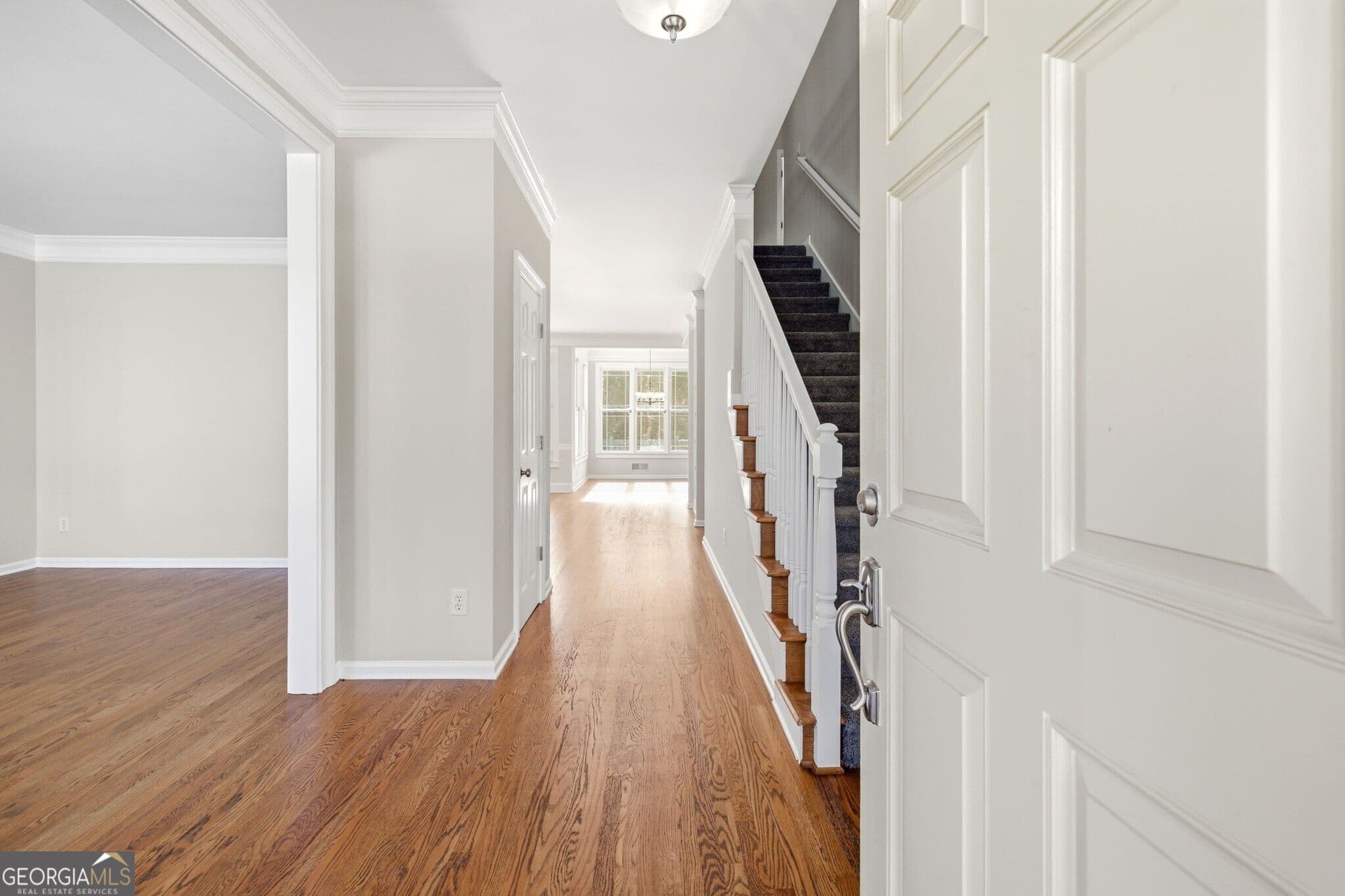 5 bedroom, 4.5 bathroom, 4,985 sq ft single family residence for sale at 7327 Rocking Chair Lane, Hoschton, GA 30548 — photo 6