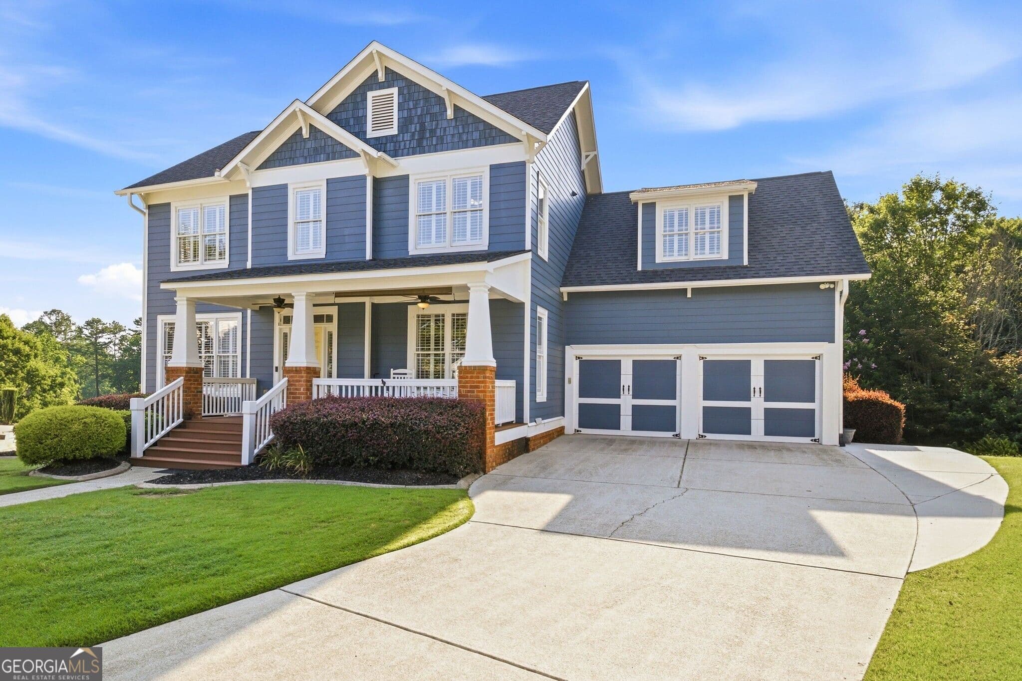 5 bedroom, 4.5 bathroom, 4,985 sq ft single family residence for sale at 7327 Rocking Chair Lane, Hoschton, GA 30548 — photo 3