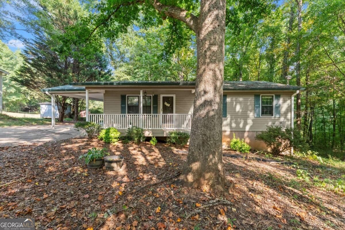 4 bedroom, 2 bathroom, 1,407 sq ft single family residence for sale at 3489 Bell Road, Gainesville, GA 30507 — photo 2