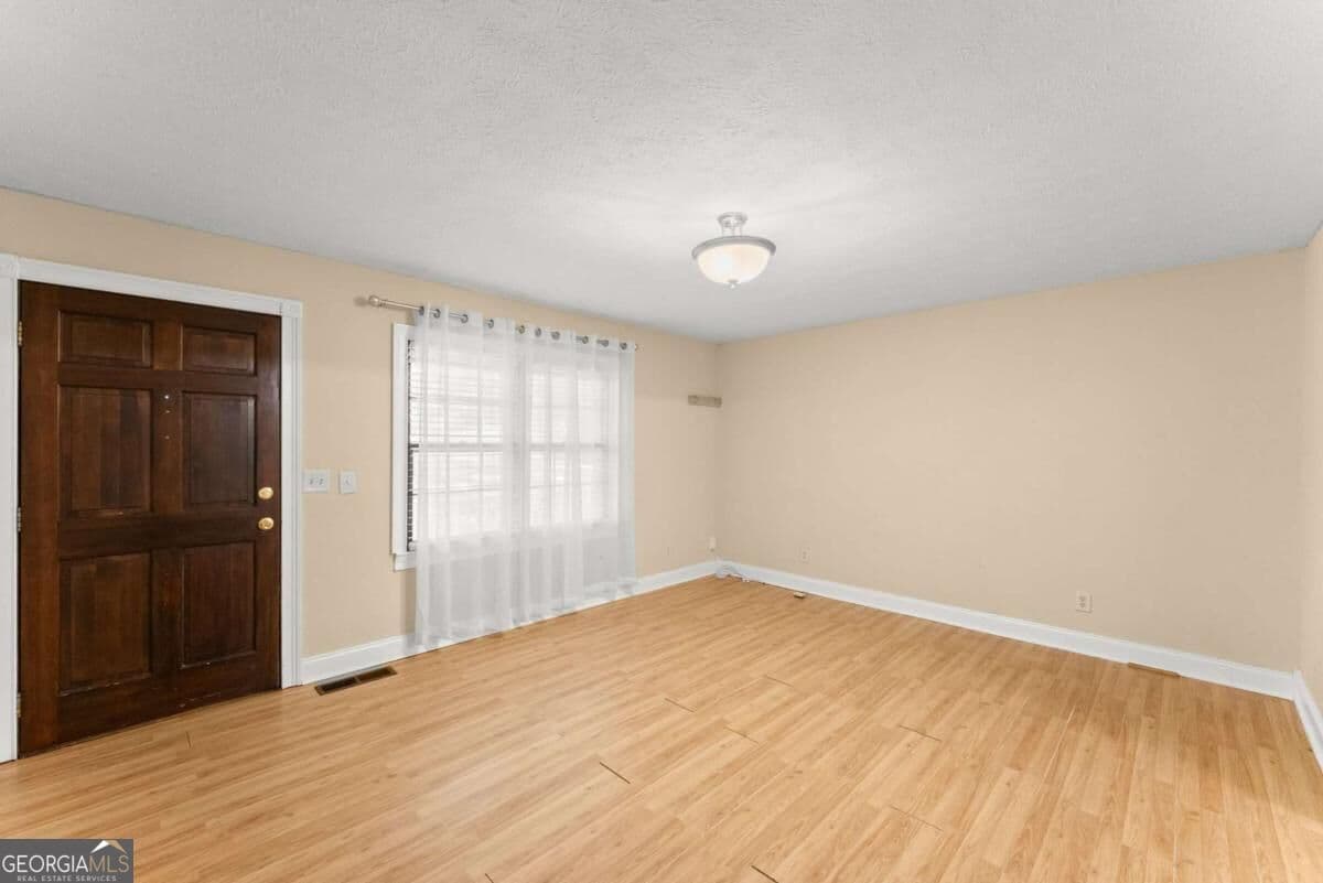 4 bedroom, 2 bathroom, 1,407 sq ft single family residence for sale at 3489 Bell Road, Gainesville, GA 30507 — photo 9