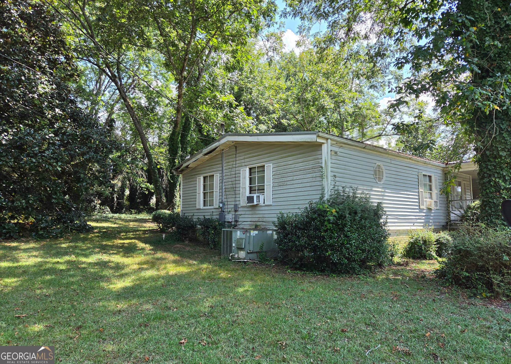 3 bedroom, 2 bathroom, 1,558 sq ft manufactured home,single family residence for sale at 810 Steele Drive, Hampton, GA 30228 — photo 3