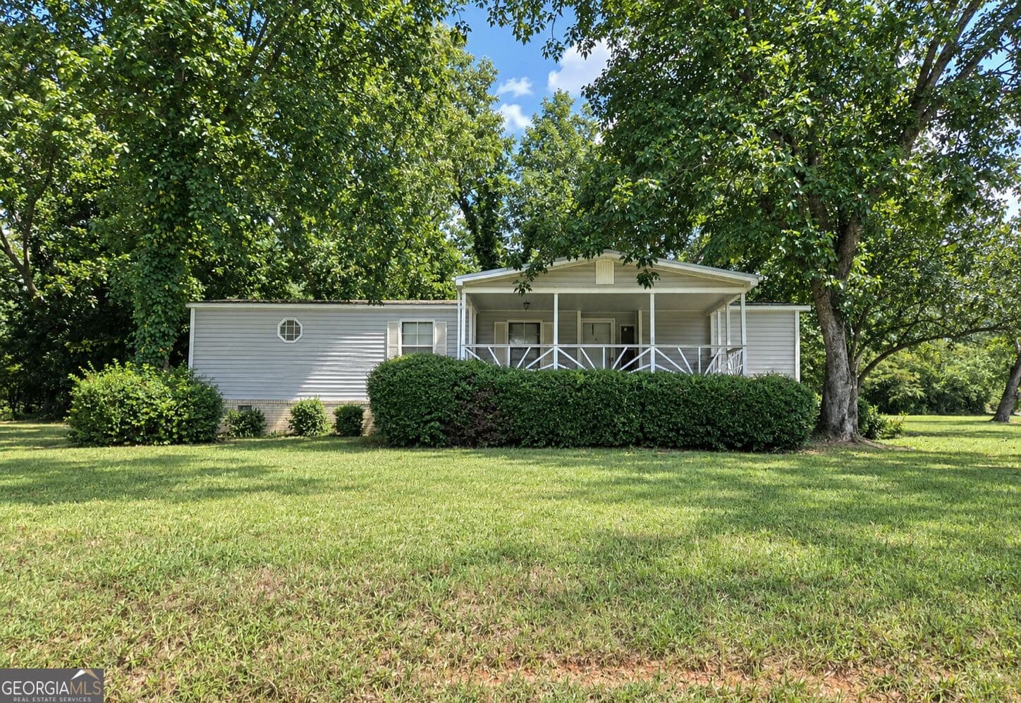 3 bedroom, 2 bathroom, 1,558 sq ft manufactured home,single family residence for sale at 810 Steele Drive, Hampton, GA 30228