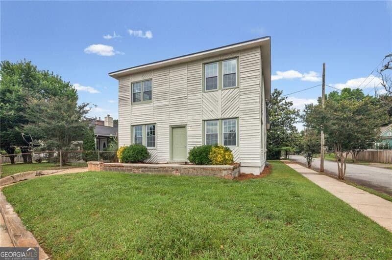 4 bedroom, 2 bathroom, 2,400 sq ft single family residence for sale at 3097 East Point Street, East Point, GA 30344 — photo 2