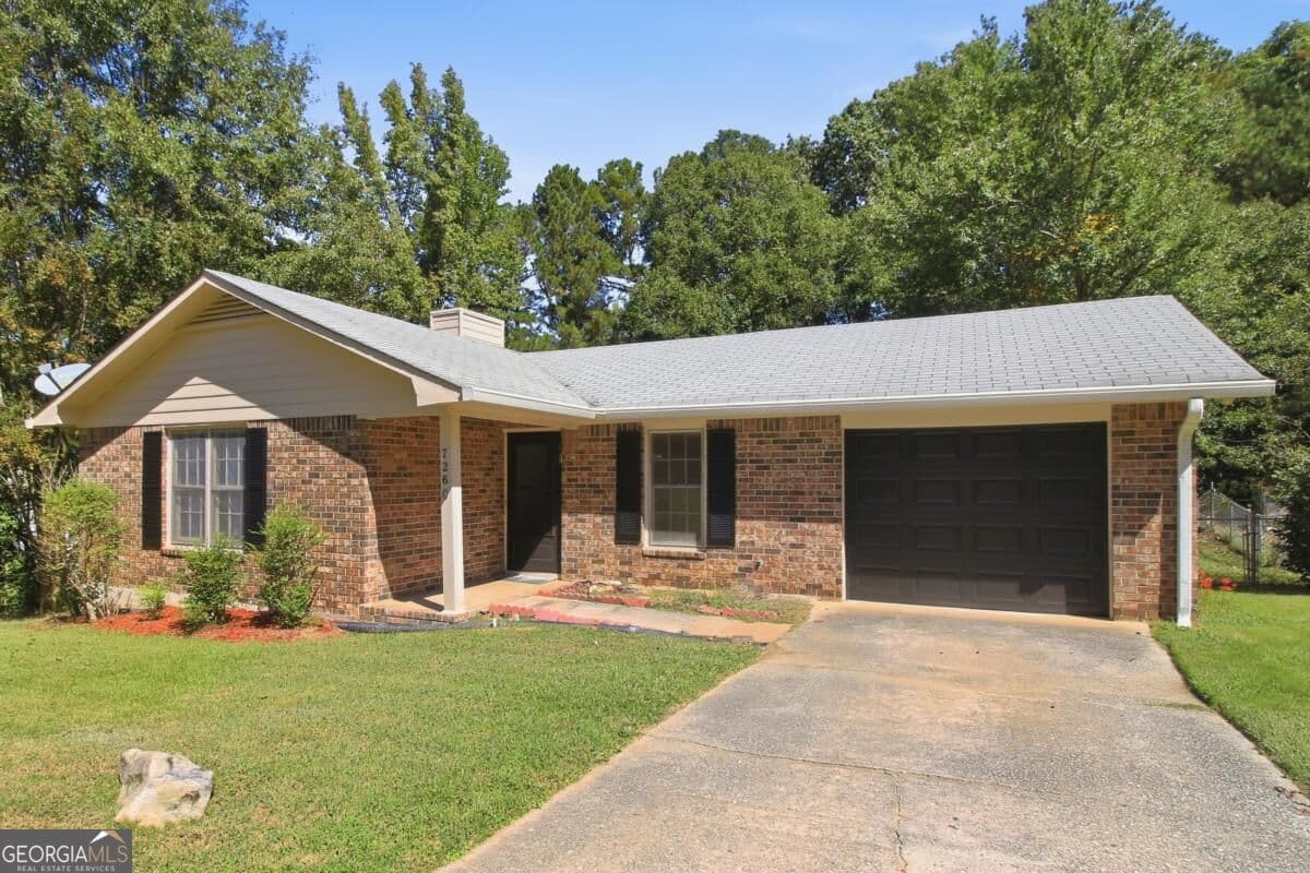 3 bedroom, 2 bathroom, 1,178 sq ft single family residence for sale at 7260 Fernwood Drive, Riverdale, GA 30296 — photo 2