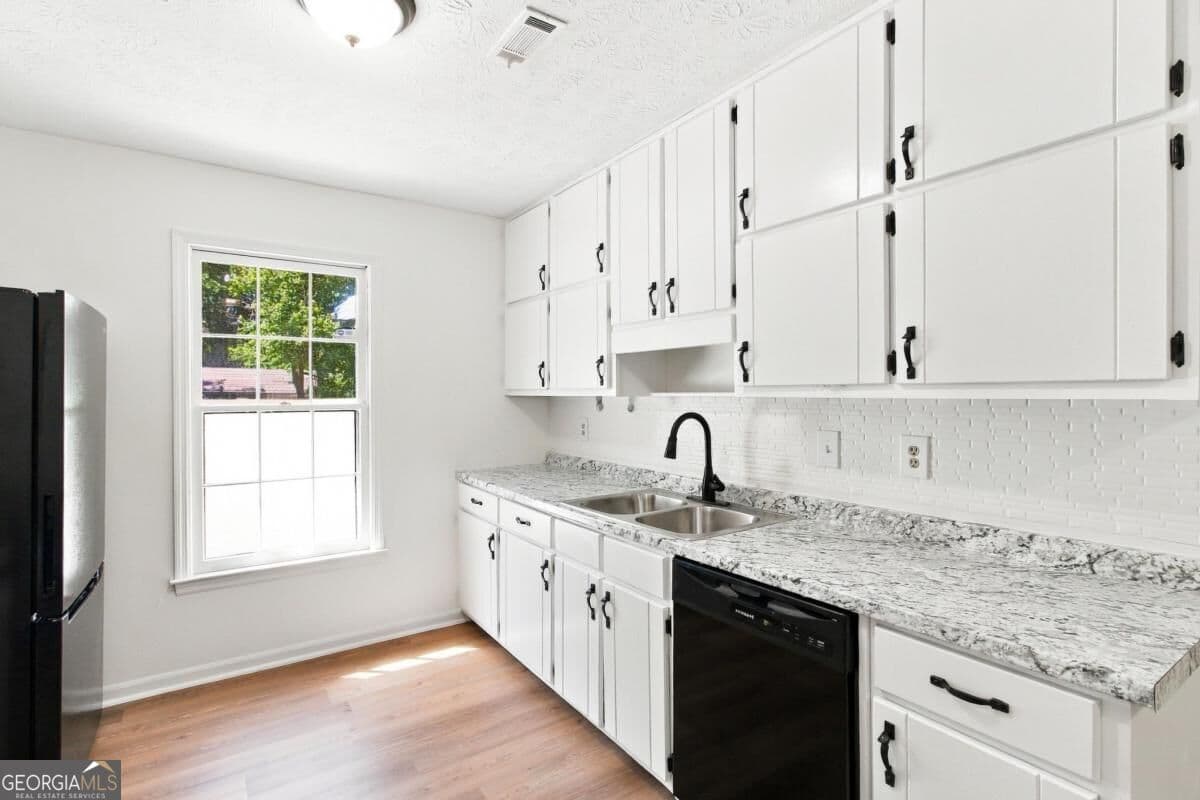 3 bedroom, 2 bathroom, 1,178 sq ft single family residence for sale at 7260 Fernwood Drive, Riverdale, GA 30296 — photo 7