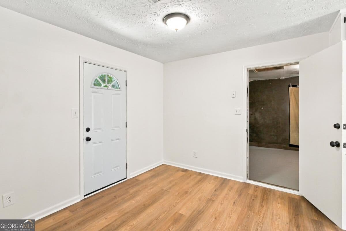 3 bedroom, 2 bathroom, 1,178 sq ft single family residence for sale at 7260 Fernwood Drive, Riverdale, GA 30296 — photo 3