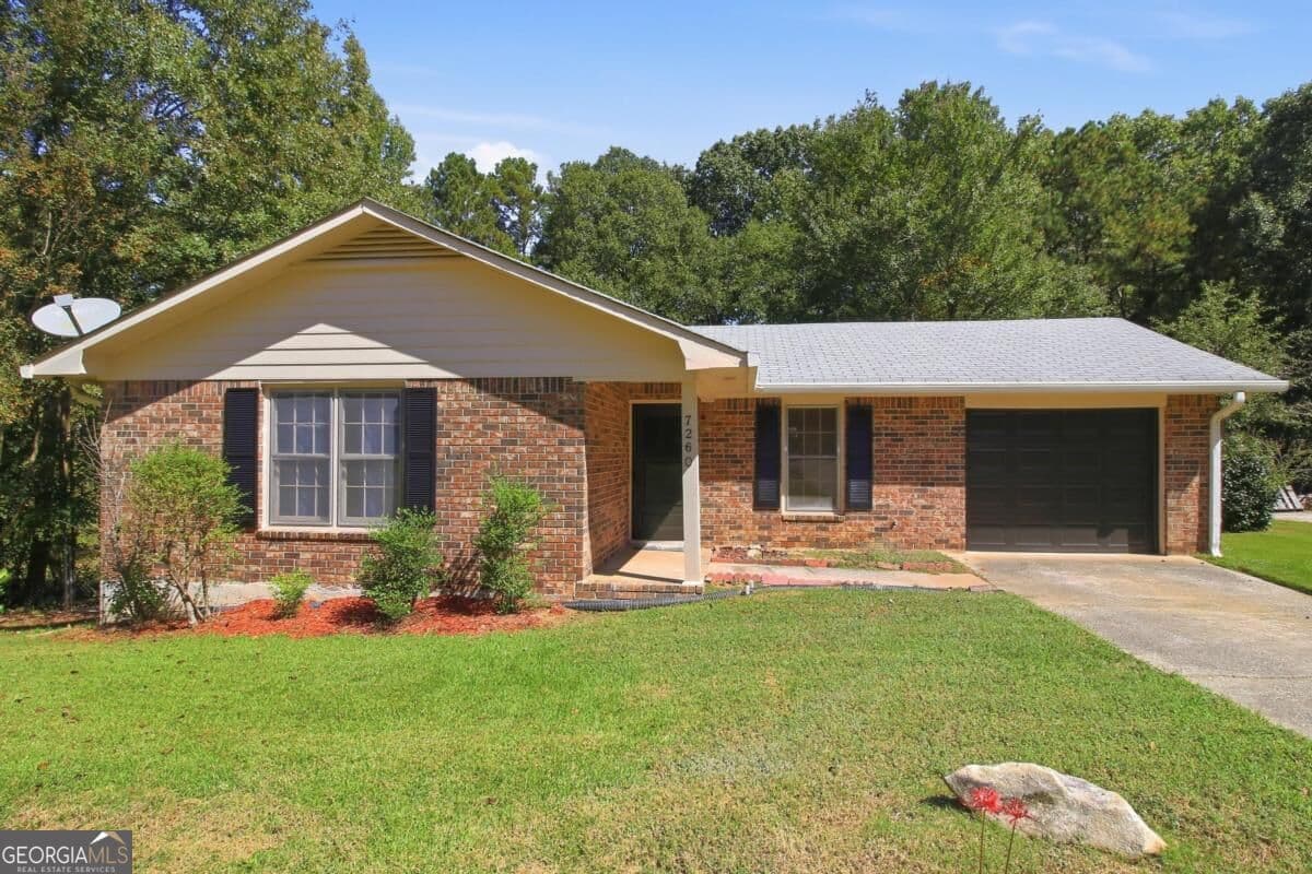 3 bedroom, 2 bathroom, 1,178 sq ft single family residence for sale at 7260 Fernwood Drive, Riverdale, GA 30296 — photo 1 of 25