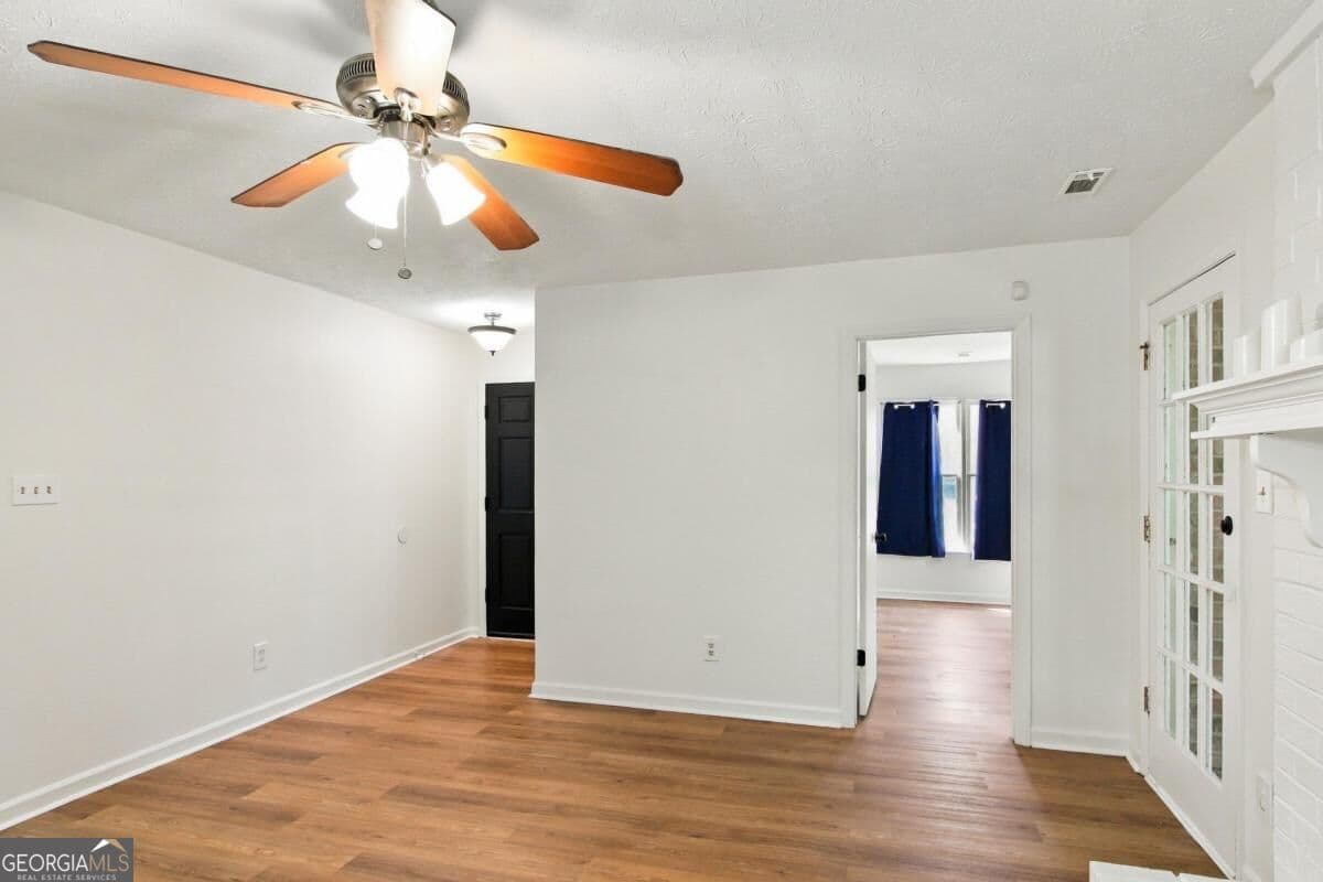 3 bedroom, 2 bathroom, 1,178 sq ft single family residence for sale at 7260 Fernwood Drive, Riverdale, GA 30296 — photo 5