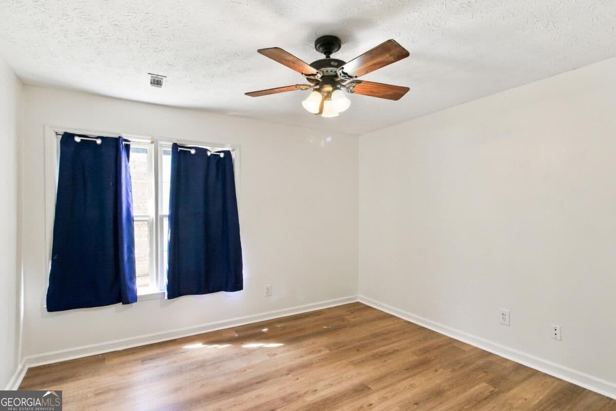 3 bedroom, 2 bathroom, 1,178 sq ft single family residence for sale at 7260 Fernwood Drive, Riverdale, GA 30296 — photo 10