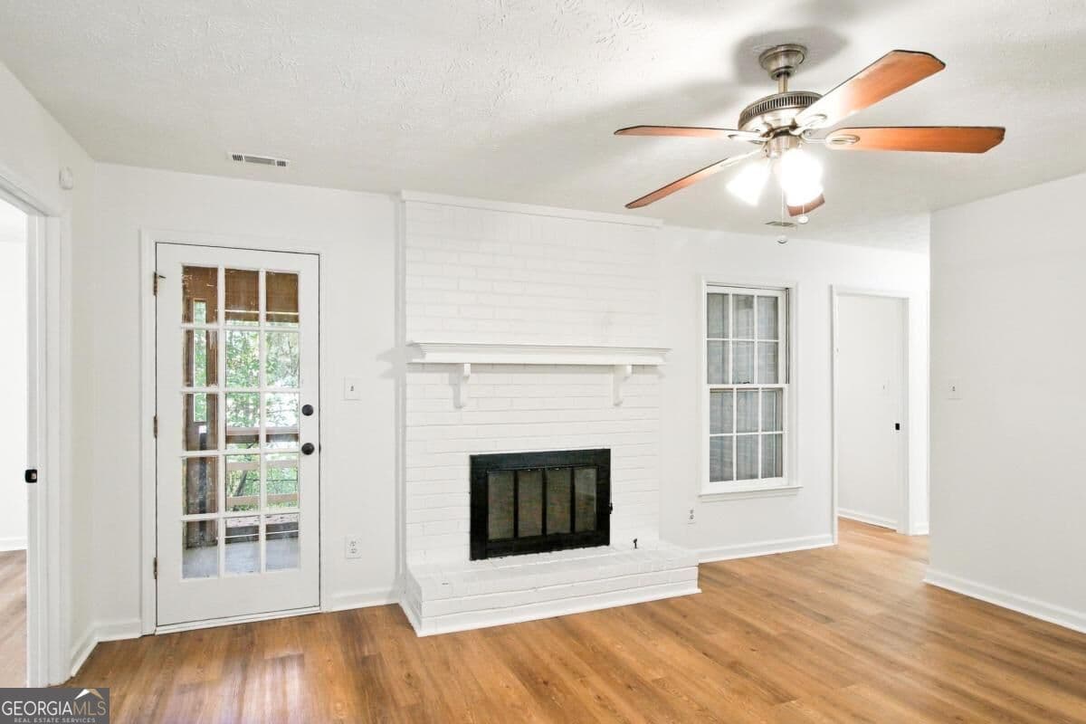 3 bedroom, 2 bathroom, 1,178 sq ft single family residence for sale at 7260 Fernwood Drive, Riverdale, GA 30296 — photo 4