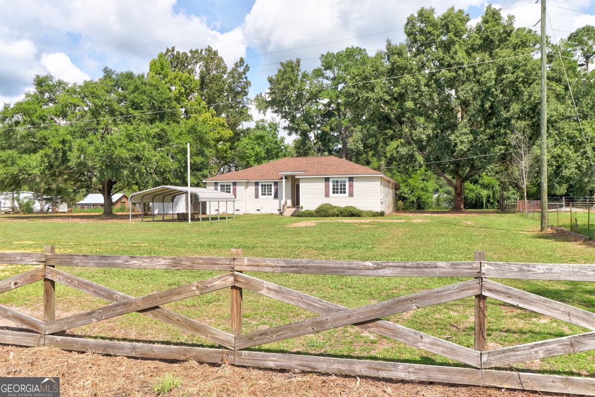 4 bedroom, 3 bathroom, 2,262 sq ft single family residence for sale at 598 Clark Road, Guyton, GA 31312 — photo 2