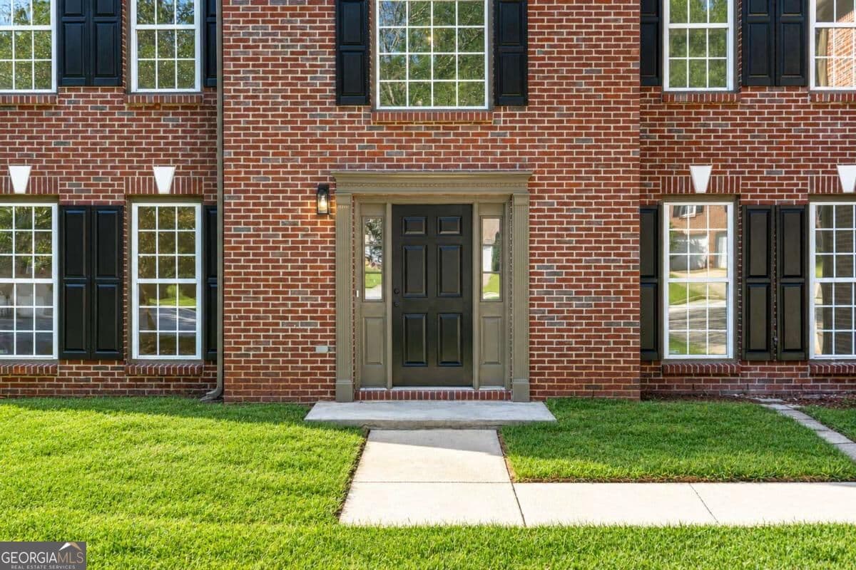 5 bedroom, 3 bathroom single family residence for sale at 6913 Wynmeadow Drive, Stone Mountain, GA 30087 — photo 4