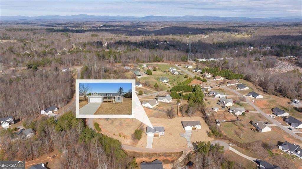 3 bedroom, 2 bathroom, 1,618 sq ft single family residence for sale at 613 Cypress Drive, Mount Airy, GA 30563 — photo 2