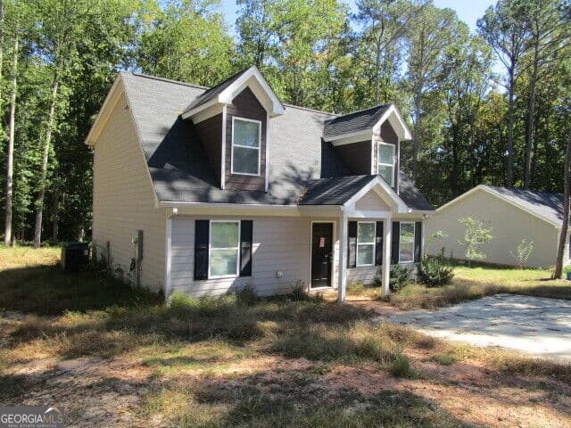 4 bedroom, 2 bathroom, 1,736 sq ft single family residence for sale at 298 Tommy Lee Fuller Drive, Loganville, GA 30052 — photo 2