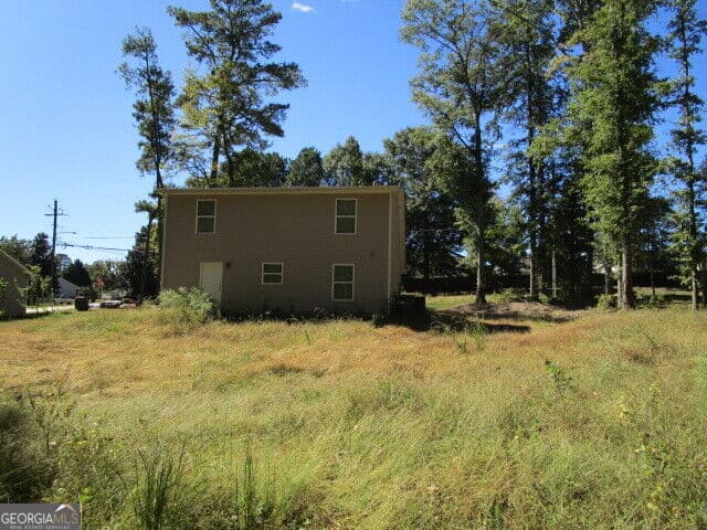 4 bedroom, 2 bathroom, 1,736 sq ft single family residence for sale at 298 Tommy Lee Fuller Drive, Loganville, GA 30052 — photo 6