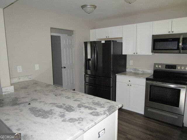 4 bedroom, 2 bathroom, 1,736 sq ft single family residence for sale at 298 Tommy Lee Fuller Drive, Loganville, GA 30052 — photo 10