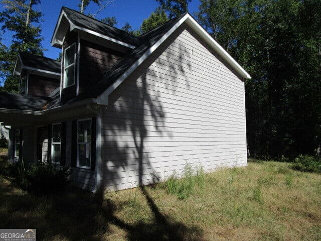 4 bedroom, 2 bathroom, 1,736 sq ft single family residence for sale at 298 Tommy Lee Fuller Drive, Loganville, GA 30052 — photo 4