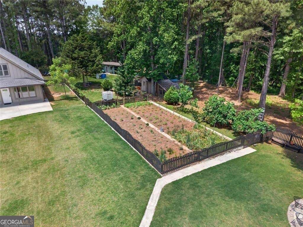 6 bedroom, 6.5 bathroom, 4,953 sq ft single family residence for sale at 7128 Highway 81, Monroe, GA 30656 — photo 6