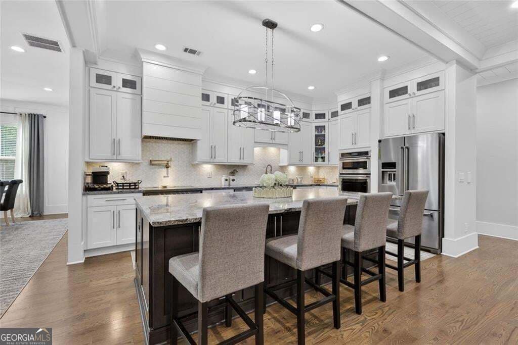 6 bedroom, 6.5 bathroom, 4,953 sq ft single family residence for sale at 7128 Highway 81, Monroe, GA 30656 — photo 5