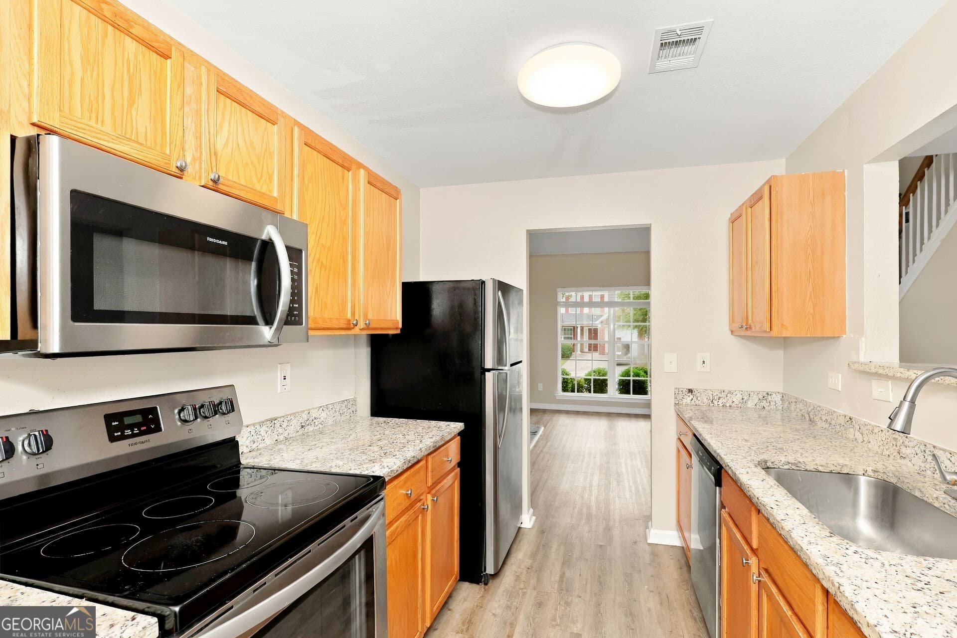 3 bedroom, 2.5 bathroom, 1,665 sq ft single family residence for sale at 4621 Ravenwood Loop, Union City, GA 30291 — photo 9