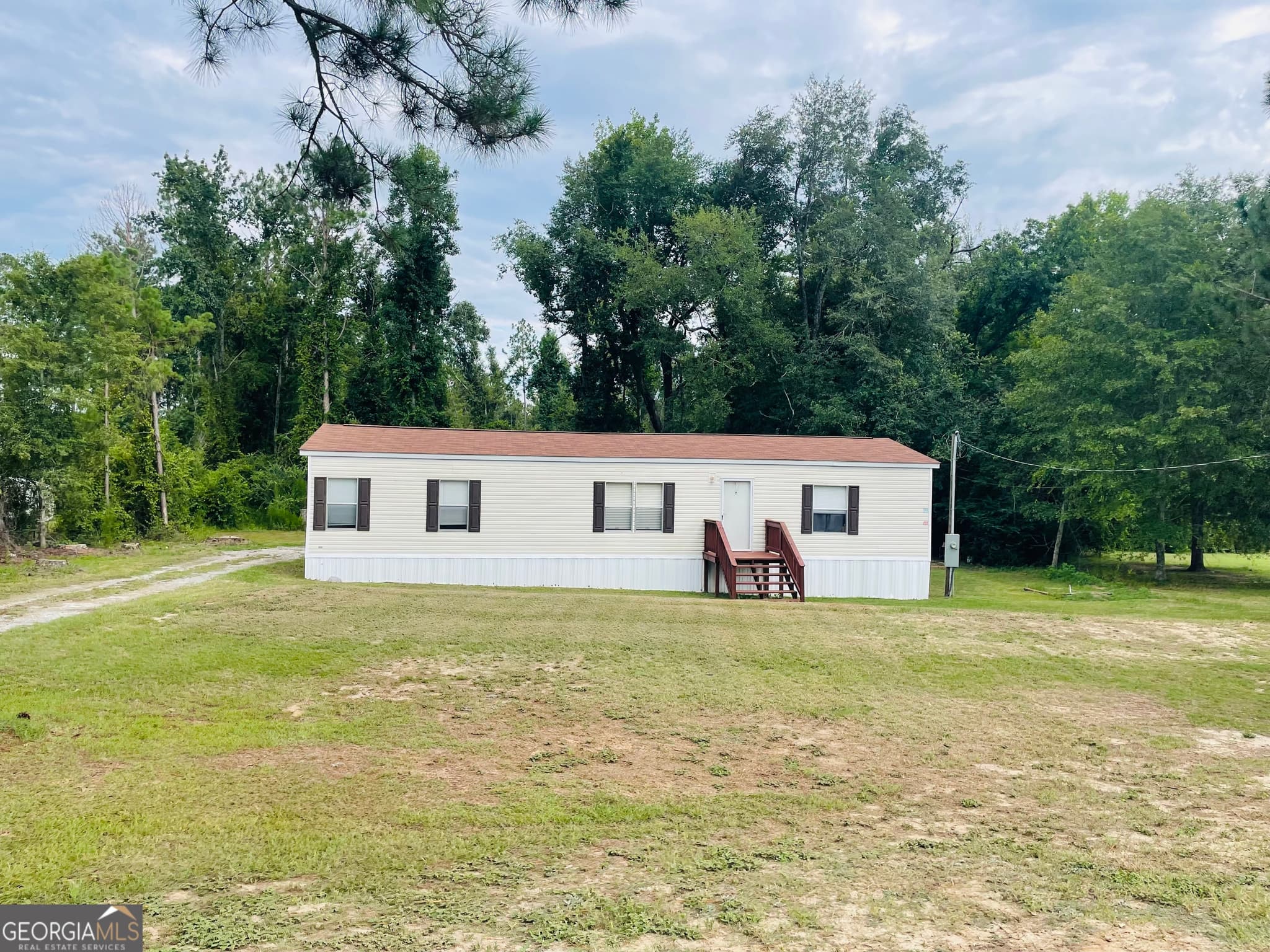3 bedroom, 2 bathroom, 1,792 sq ft manufactured home,single family residence for sale at 163 Indigo Road, Lyons, GA 30436