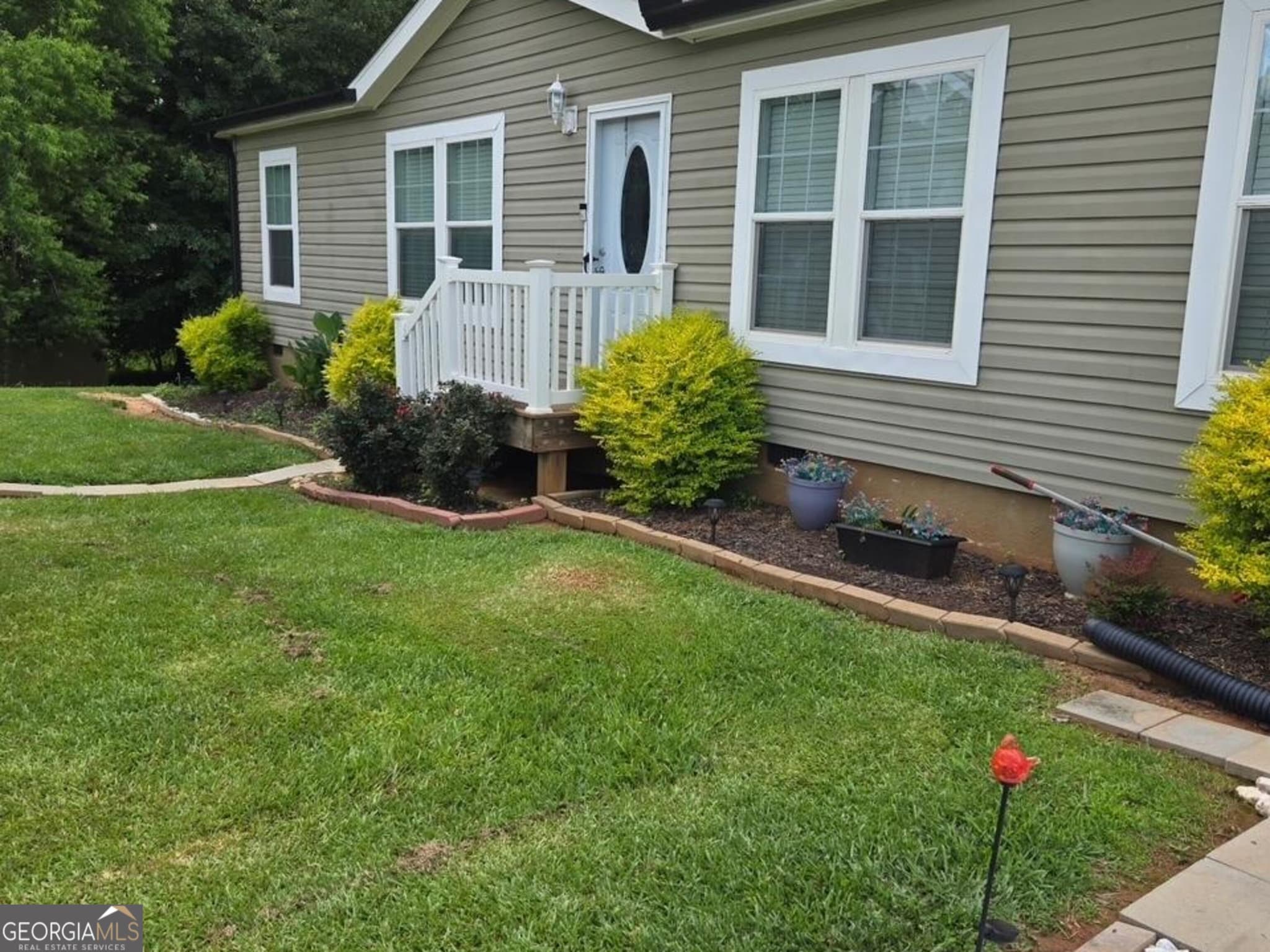 3 bedroom, 2 bathroom, 1,296 sq ft manufactured home,single family residence for sale at 50 Meadow View Street, Newnan, GA 30263 — photo 2