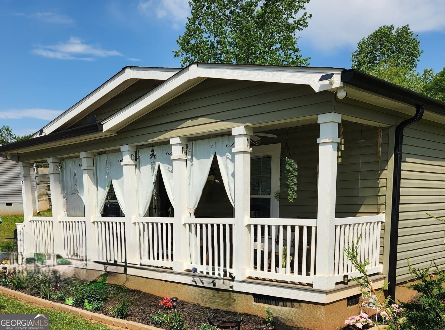 3 bedroom, 2 bathroom, 1,296 sq ft manufactured home,single family residence for sale at 50 Meadow View Street, Newnan, GA 30263 — photo 3