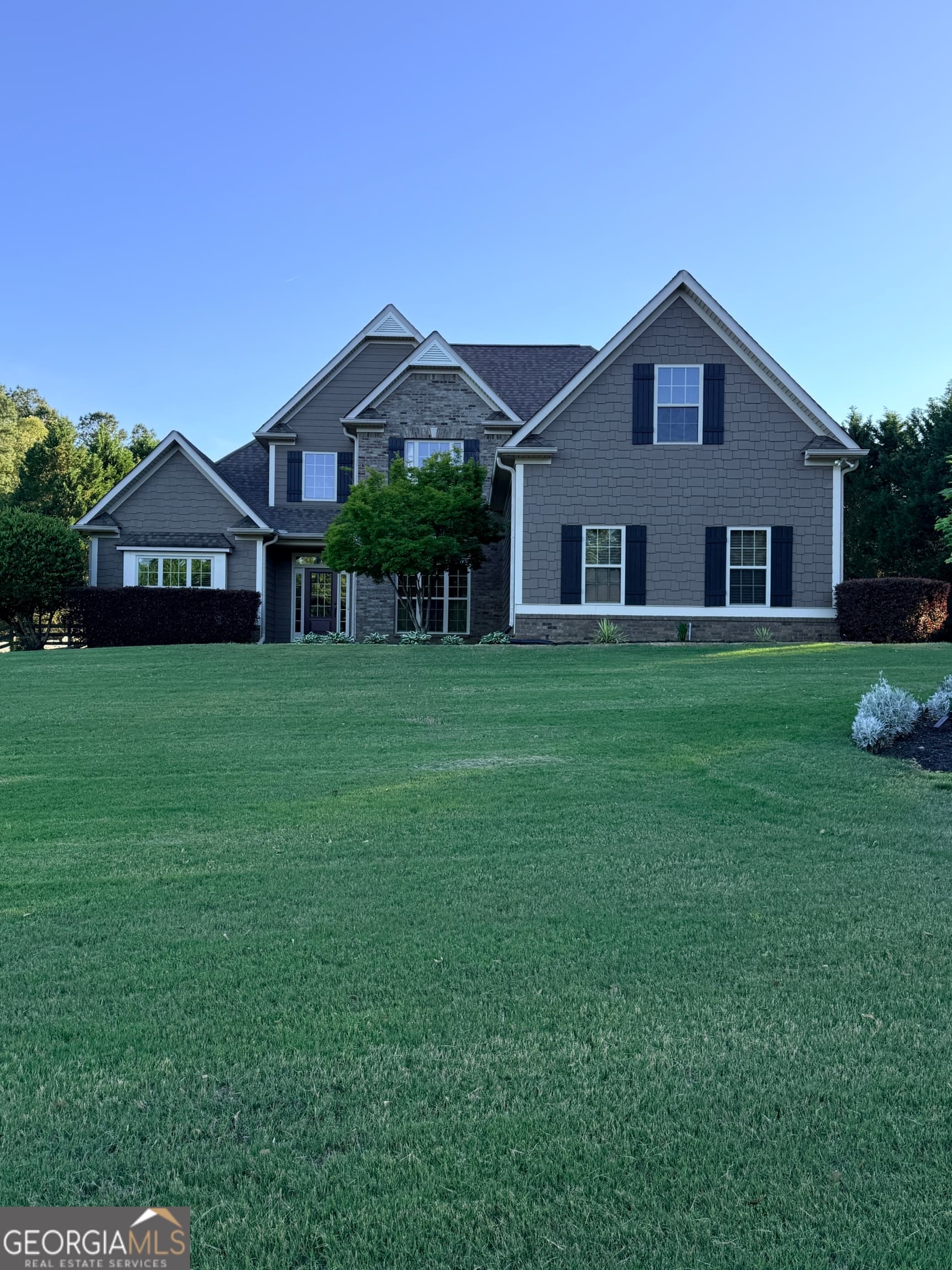 4 bedroom, 3 bathroom, 2,987 sq ft single family residence sold at 127 Sandisfield Drive, Sharpsburg, GA 30277