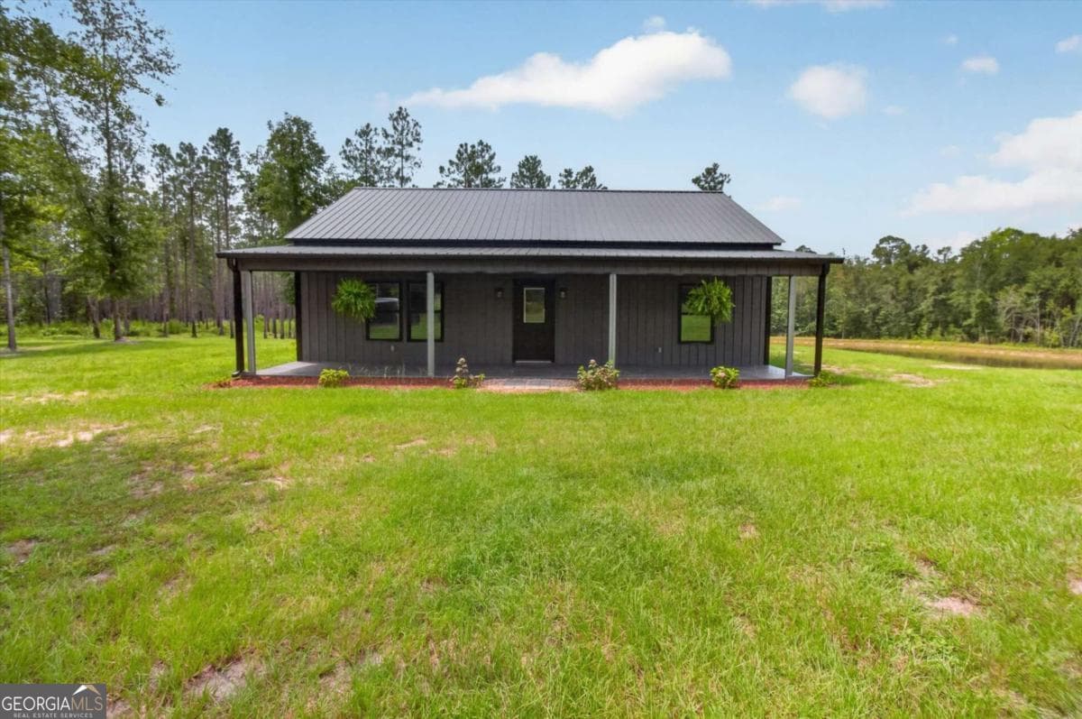 2 bedroom, 2 bathroom, 1,200 sq ft single family residence for sale at 660 Old Manassas Foy Road, Register, GA 30452 — photo 2