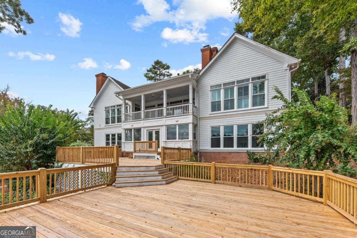 6 bedroom, 4.5 bathroom, 6,120 sq ft single family residence for sale at 1651 Lighthouse Circle, Greensboro, GA 30642 — photo 6