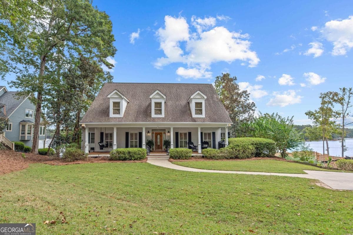 6 bedroom, 4.5 bathroom, 6,120 sq ft single family residence for sale at 1651 Lighthouse Circle, Greensboro, GA 30642 — photo 3